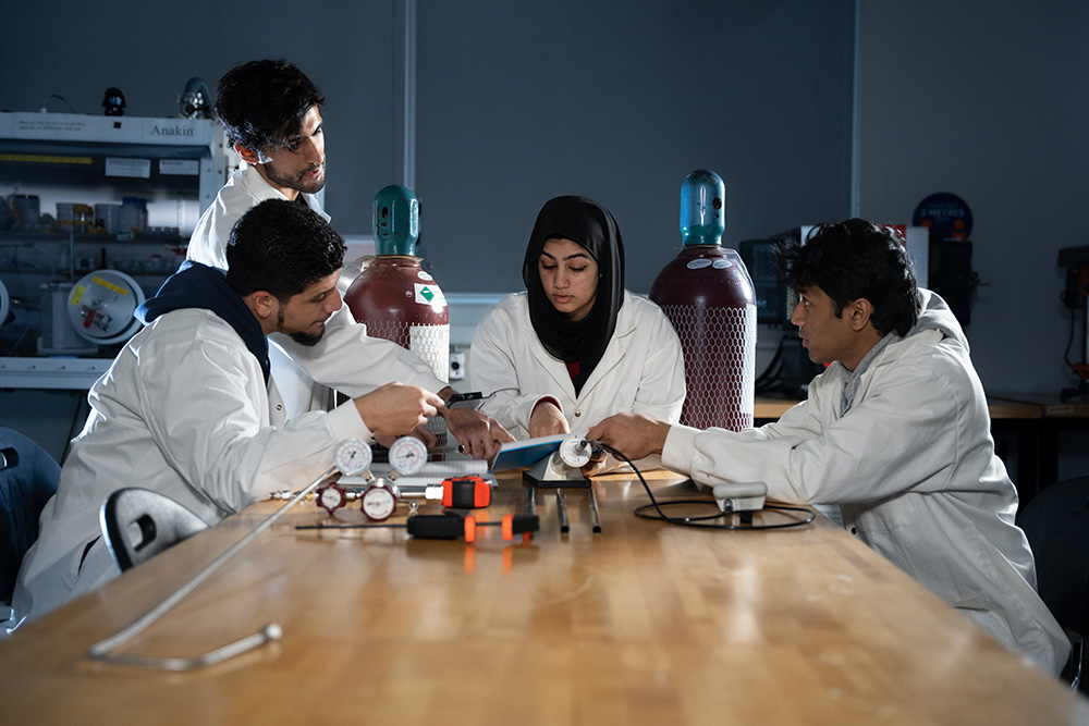 Ontario Tech Nuclear Engineering students in an Energy Research Centre laboratory at the university